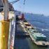 Barge loading from ship