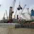 Barges being loaded from ship in NOLA